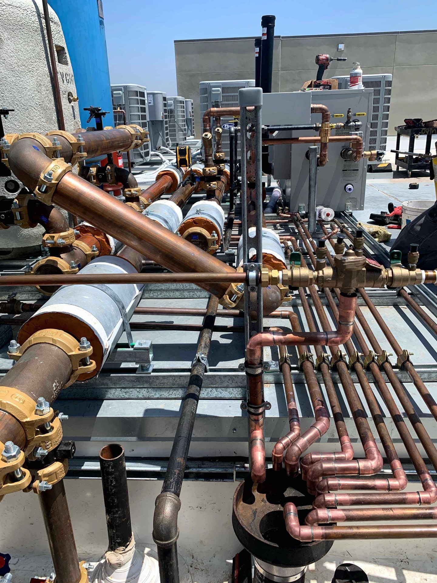 Commercial rooftop copper plumbing manifold by BluePoint Plumbing in Santa Clarita